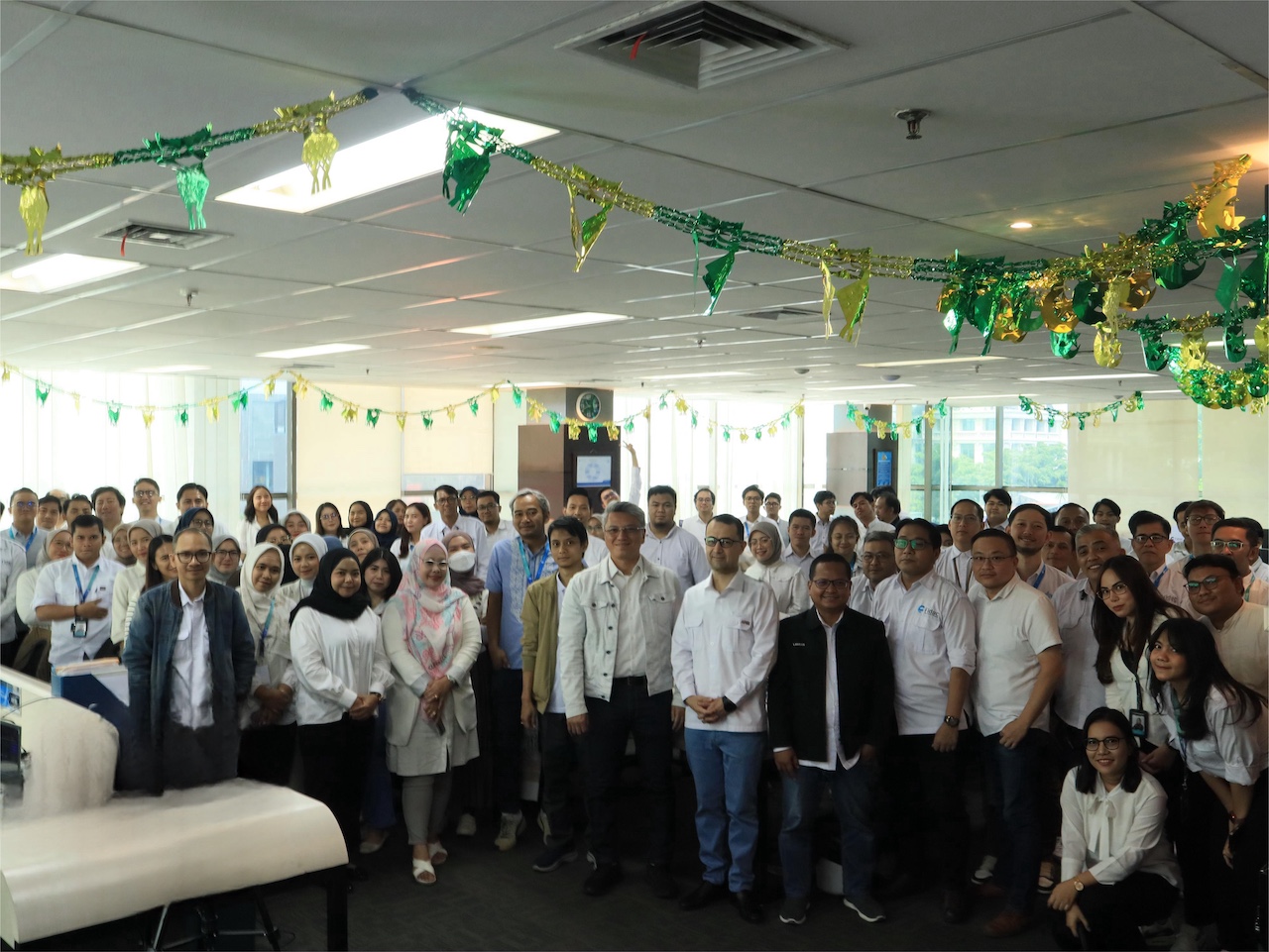 Salis staff gathering for Eid celebration at the office